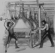 Luddites smashing a loom