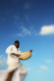 A parai drum player