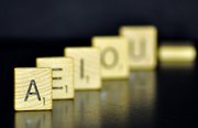 Scrabble tiles vowels